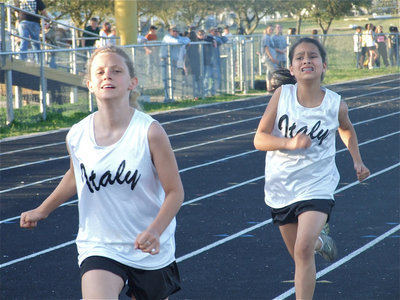 Image: The home stretch — 7th graders Makenzie Davis and Ana Luna pushed themselves all the way to the finish line.