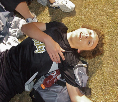 Image: Can’t…breathe… — 7th grader Chace McGinnis collapses in exhaustion after his race.