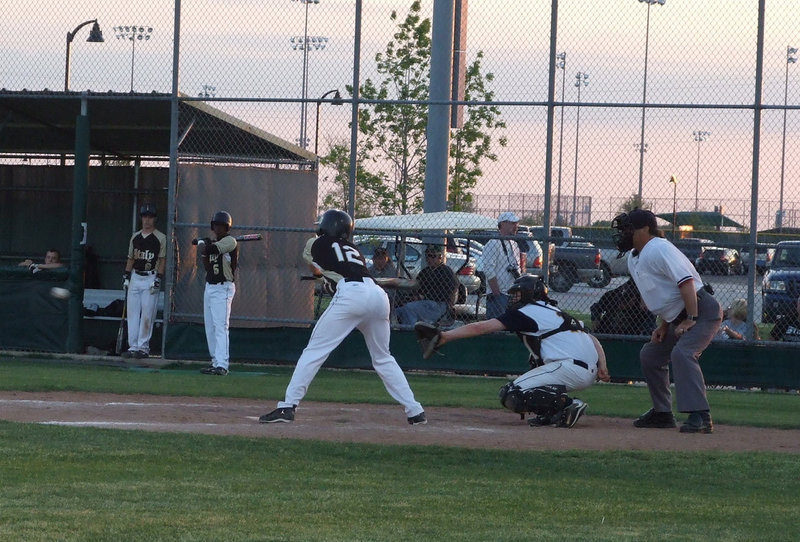 Image: Ryan leans in — Ryan Ashcraft gets ready to whack that ball!