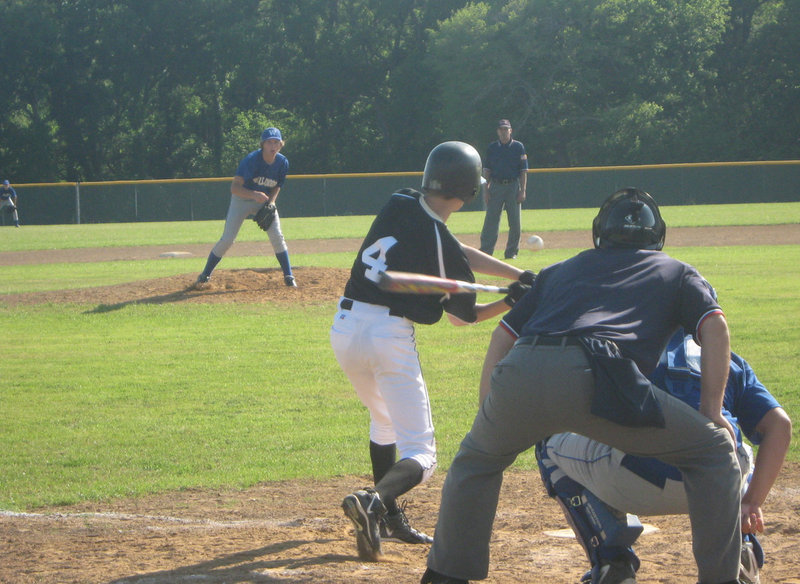 Image: DeMoss can hit — Alex DeMoss takes careful aim and hits it low in Wortham.