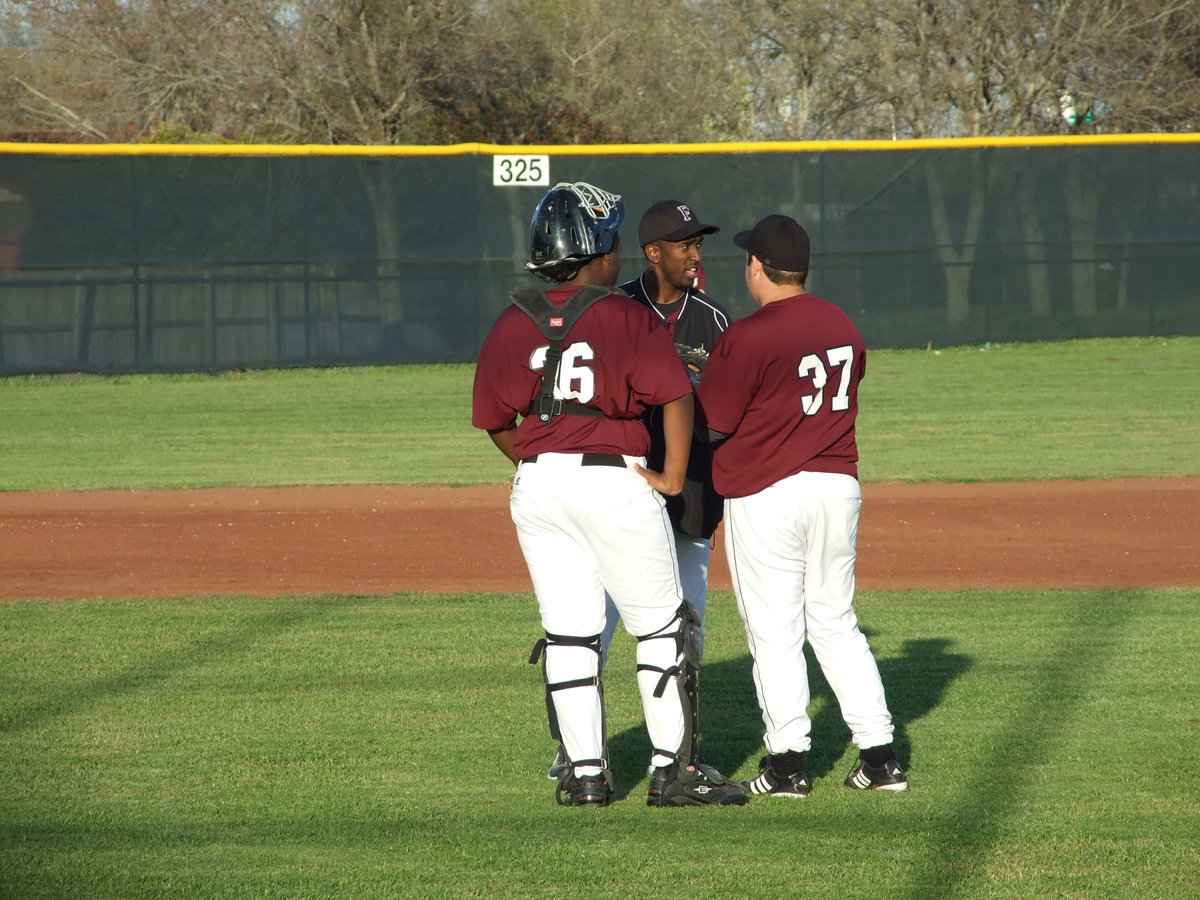 Image: We have to have a talk — Faith Family coach seems a little worried about his pitcher.