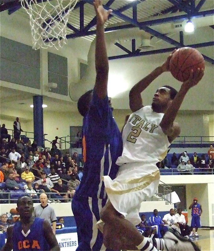 Image: Hanging in there — The lead changed several times in the 1st half but Heath Clemons and the Gladiators hung in there and eventually pulled away to win 88-68.