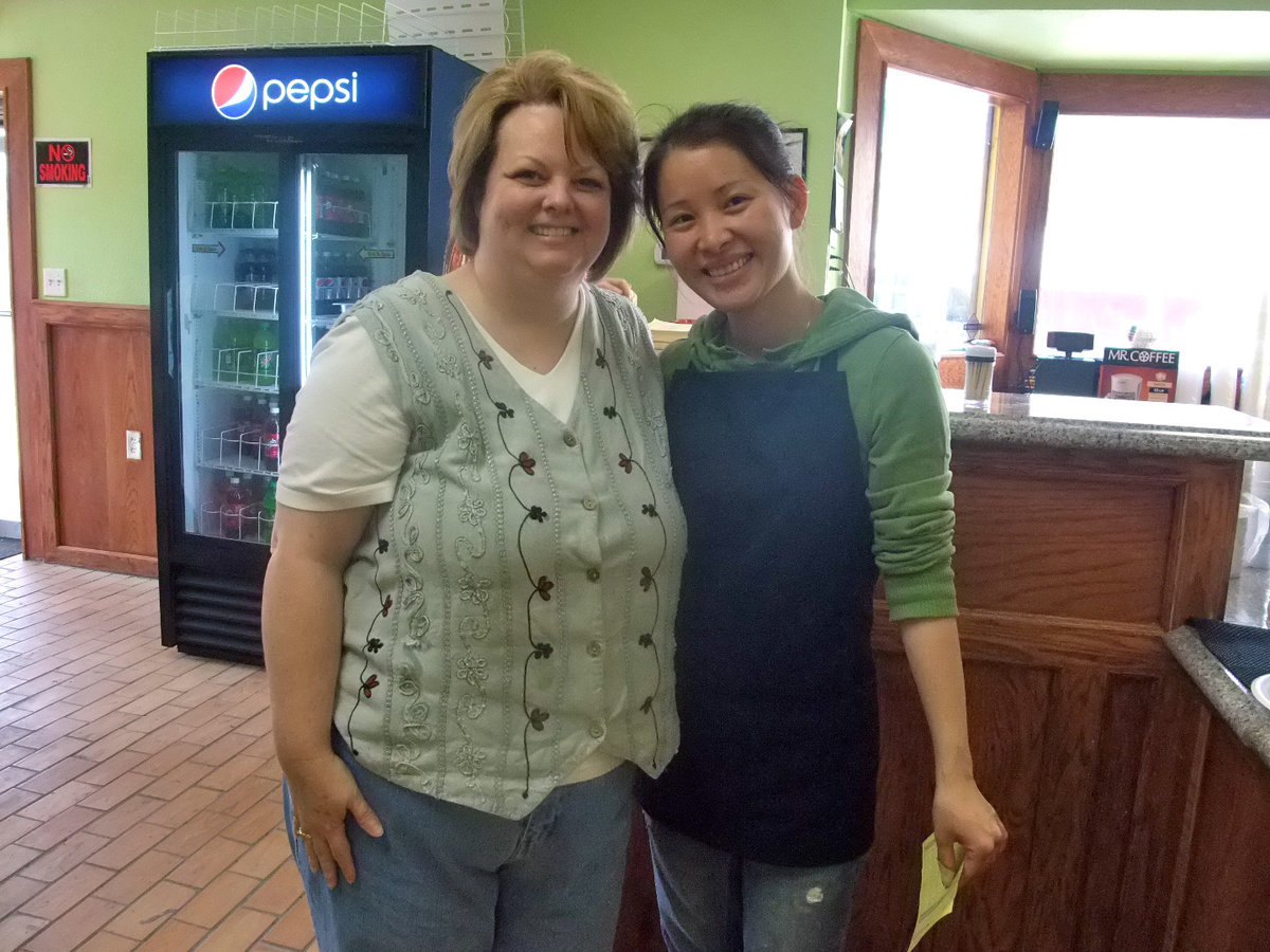 Image: Renee and Lim — Renee Finley and Lim Mei posing for this picture. Renee said, “It was better than the similar food on our last cruise.”