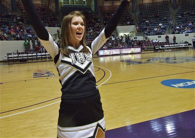 Image: Rossa cheers — IHS cheerleader Kaitlyn Rossa tries to get the Gladiator fans fired-up for Italy’s second game of the regional tournament in Abilene.