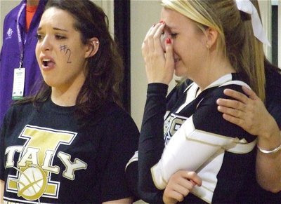 Image: Tearful end — Kelli Strickland and Lexie Miller get consoled after Italy’s 62-58 regional final loss to the Bronte Longhorns on Saturday in Abilene.