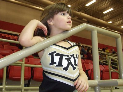 Image: Taking it all in — Honorary mascot Taylor Souder tries to get a handle on the moment.