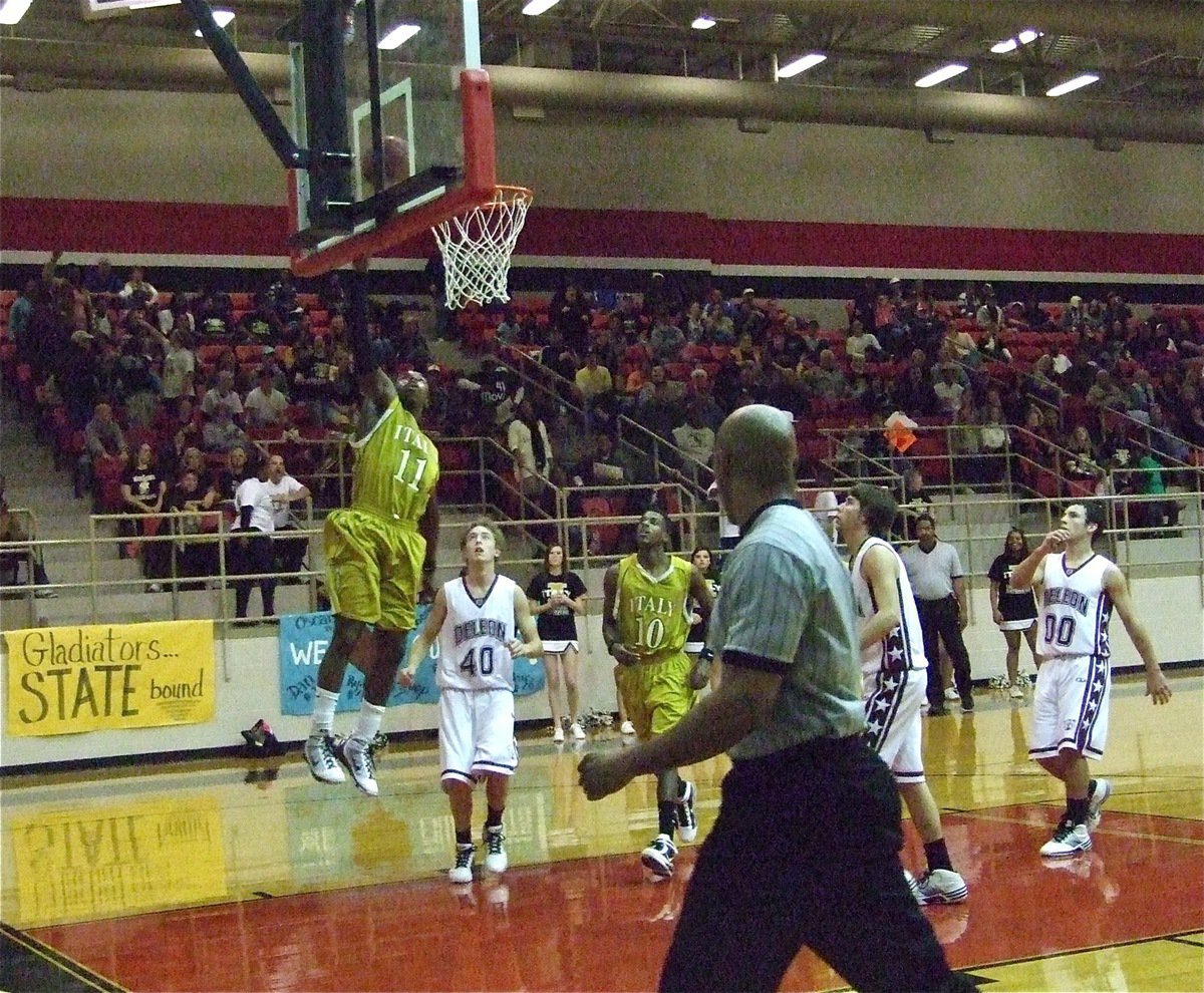 Image: Anderson again — Jasenio Anderson(11) and the Italy Gladiators move one layup closer to State.