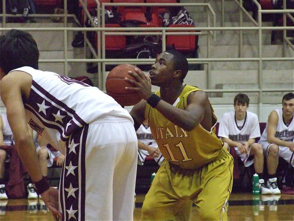 Image: At the Point — Point guard Jasenio Anderson(11) picks up a point from the foul line.