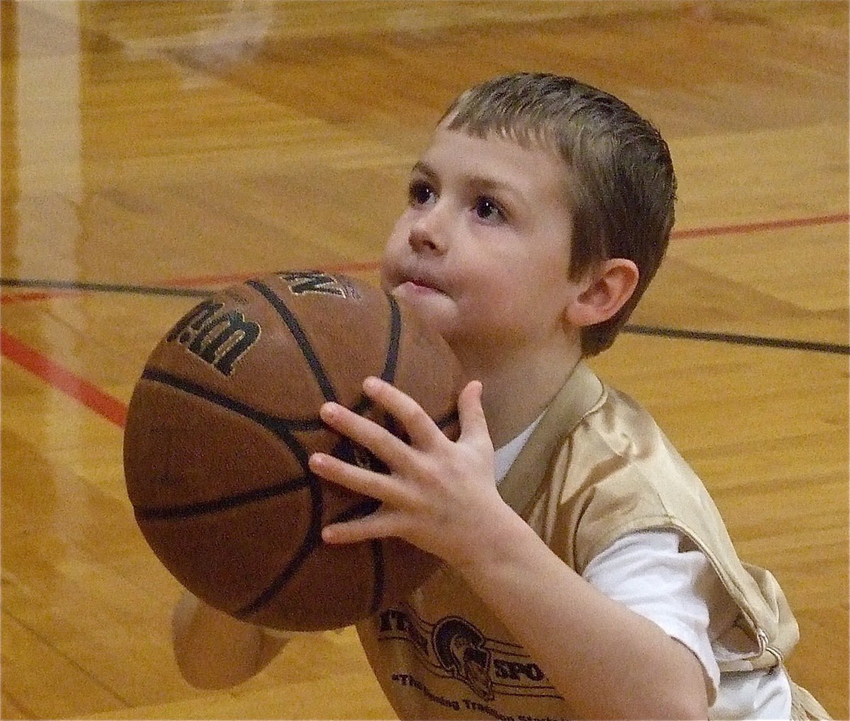 Image: Bryce concentrates — Bryce DeBorde(4) puts in a free throw at halftime.