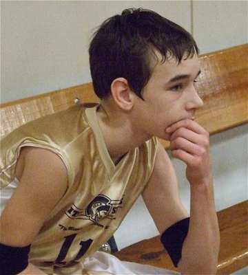 Image: Ryan Connor — Ryan Connor(11) ponders his team’s performance while taking a well earned breather.