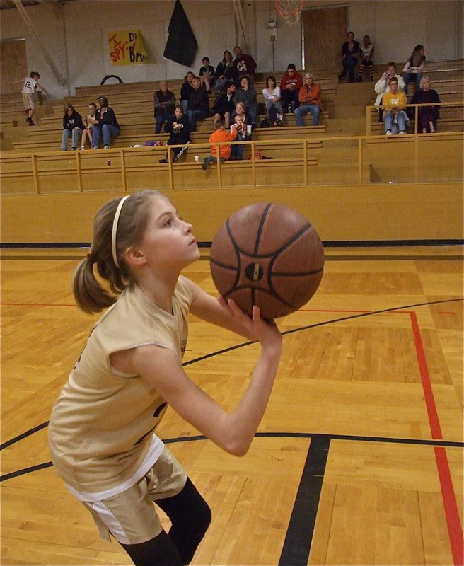 Image: Practice pays off — After winning a jump shot contest during Thursday’s practice, Halee Turner(24) swished in a 3-pointer in the 2nd quarter of Saturday’s game before practicing her free throws at halftime.