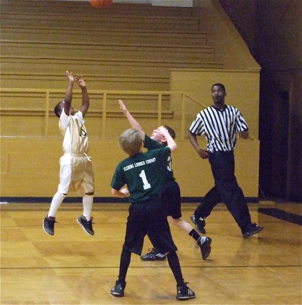 Image: Kendrick has hops — Kendrick Norwood(10) pulls up for a jump shot against Hillsboro Forest Green.