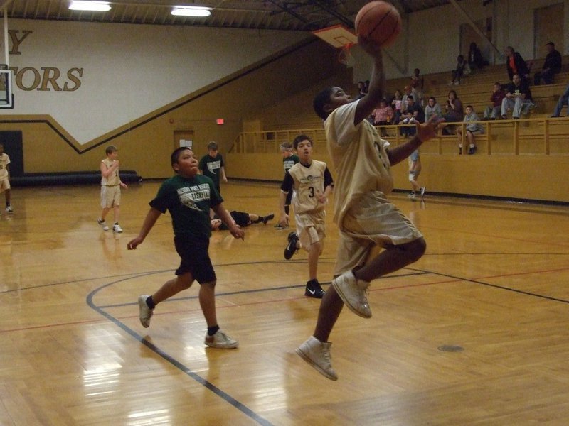 Image: Human Hurricane — Hurricane Kenneth Norwood(23) leaves a path of destruction behind him on his way to scoring a game high 7-points.