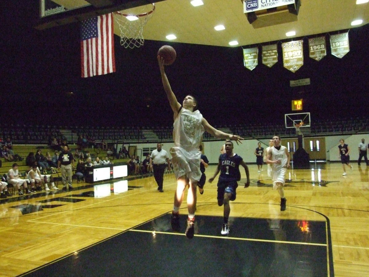 Image: Kyle Jackson — J.V. Gladiator Kyle Jackson(50) goes up for the finger roll.