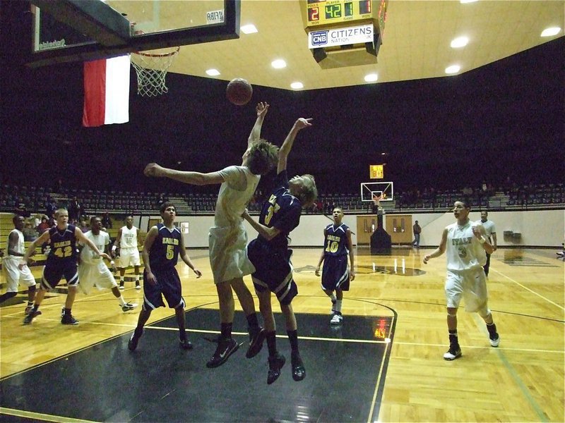 Image: Dan reaches for the ball — Dan Crownover(1) battles for the ball.