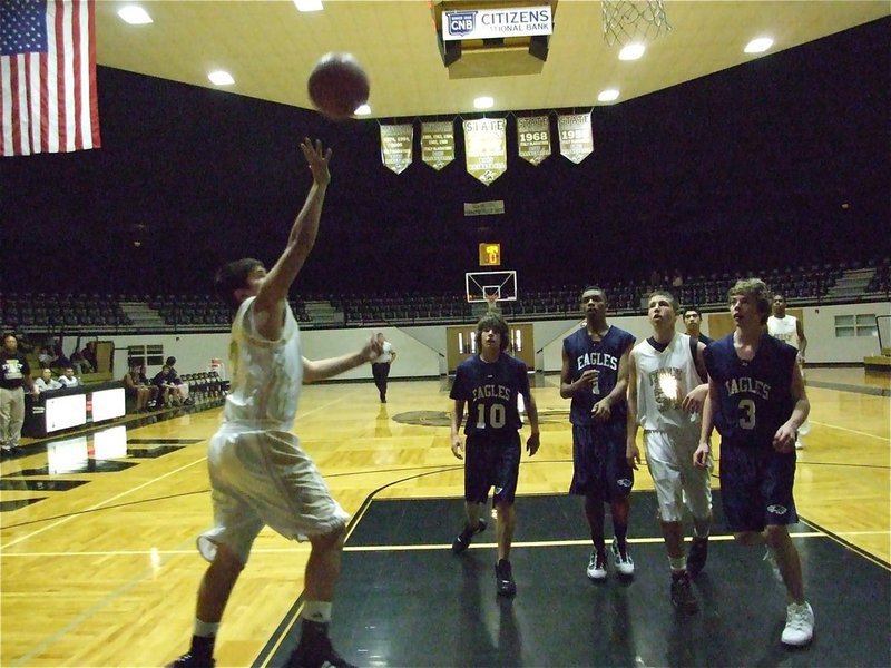 Image: Reid gets open — Reid Jacinto(2) gets an open look at the basket.