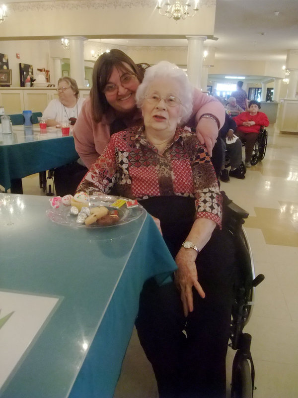 Image: Carolyn and Margaret — Carolyn Powell (activities director) and Margaret Oliphant ready to party.