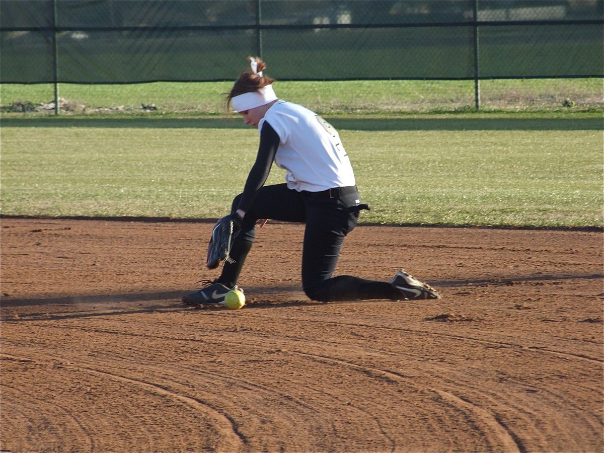 Image: Bailey’s on the ball — Bailey Bumpus covers a ground ball during warm-ups.