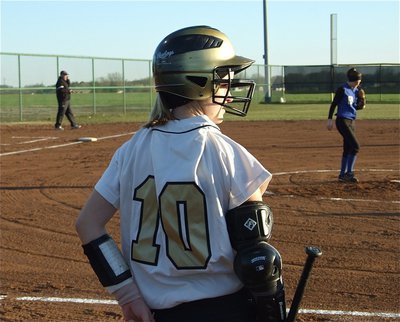 Image: Courtney in full gear — Senior Courtney Westbrook is geared up and ready to bat.