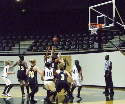 Image: Battle Under The Basket — The Lady Gladiators and Lady Bulldogs take each other to task under the basket.