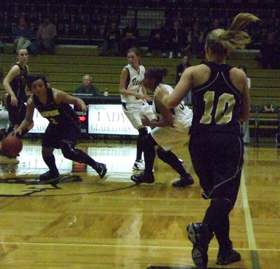 Image: Dawson Works The Ball — Brittany Carr #1 from Dawson gave 9 points to the Lady Bulldogs Tuesday night.