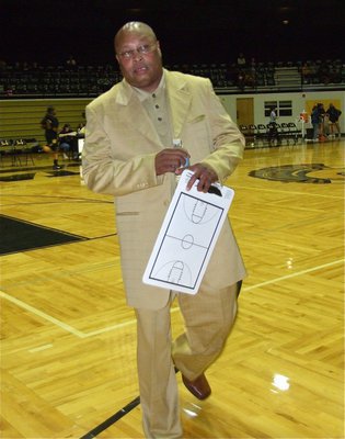 Image: Very sharp — Coach Larry Mayberry was dressed in all gold Tuesday night.