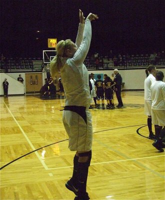 Image: Megan warms up — Shooting ace Megan Richards gets ready to show her hand against Itasca.