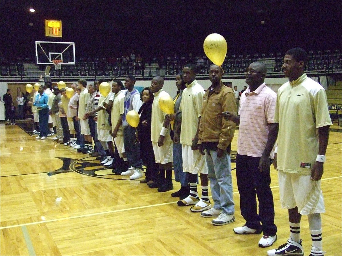 Image: Italy players honor their families on Parent Night — Proud parents stand for an ovation along side their sons who play for the Italy Gladiators basketball team on Friday for “Parent Night.”