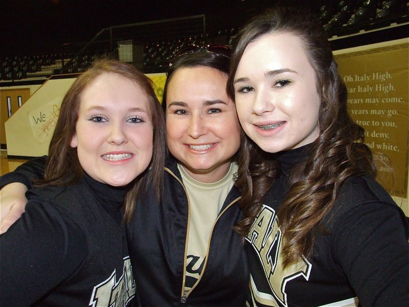 Image: Go Italy! — Jesica Wilkins, Andrea Hooker and Meagan Hooker are all smiles on “Parent Night” inside the Italy Coliseum.