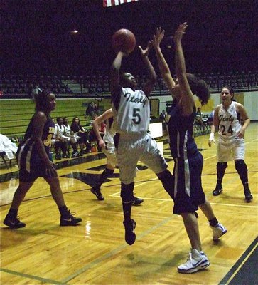 Image: Jameka Copeland — Jameka Copeland(5) rises against the Lady Eagle defense.