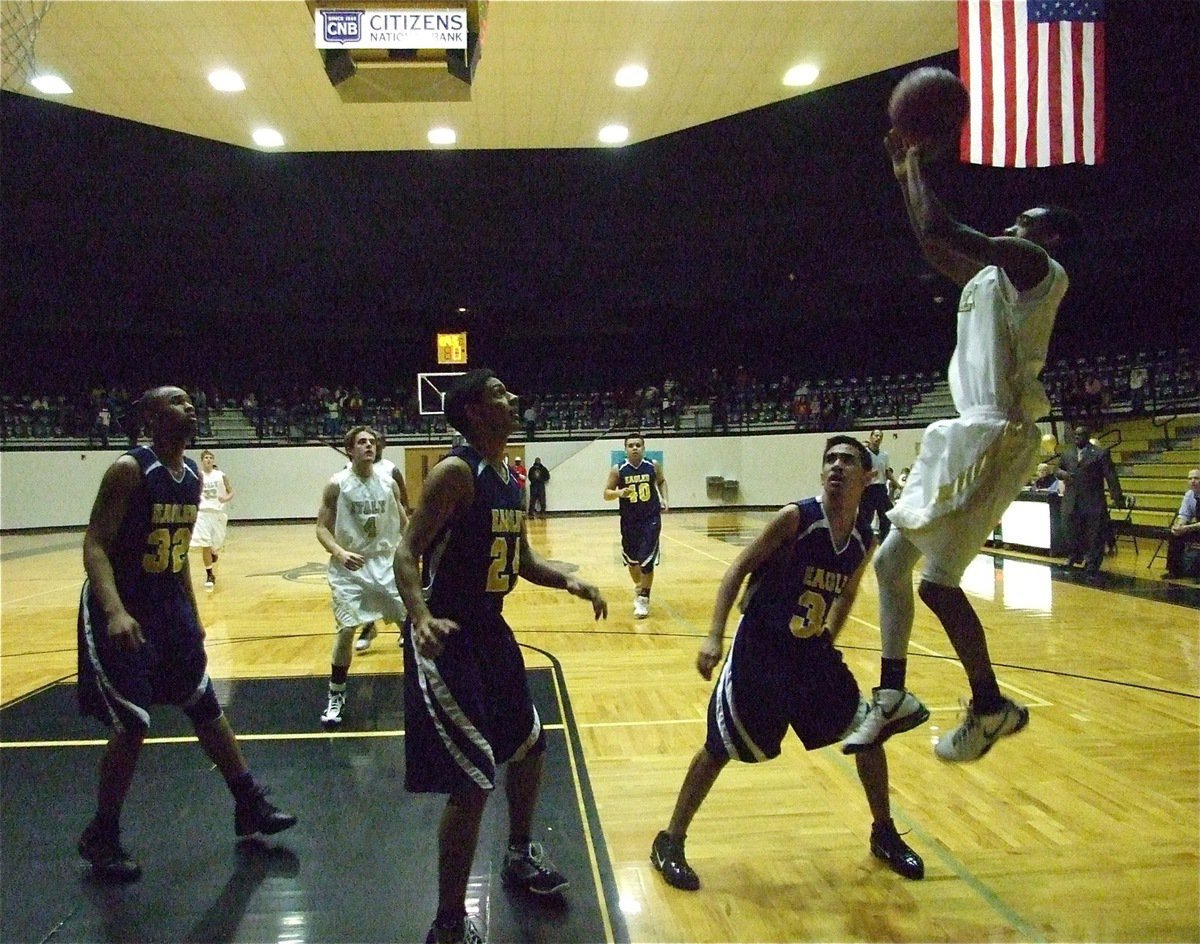 Image: Heath on the baseline — Heath Clemons(2) shoots a shot from the baseline.