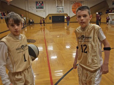 Image: Levi and Ty — Guards Levi McBride(1) and Ty Windham(12) helped lead their team to a win.