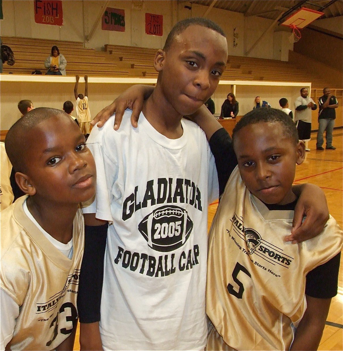 Image: 5-0! — Jarvis Harris(33), Oshea Turner and Kevin Johnson(5) stand proud after helping “Norwood’s Netpoppers” improve their record to 5-0.