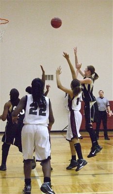 Image: Kaitlyn Rossa — Kaitlyn Rossa(3) puts up a jump shot from the middle of the lane.