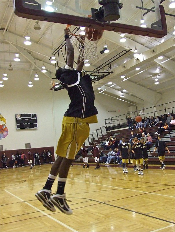 Image: King of Dunk — Italy’s John Isaac excites the crowd before their game against the Eagles.