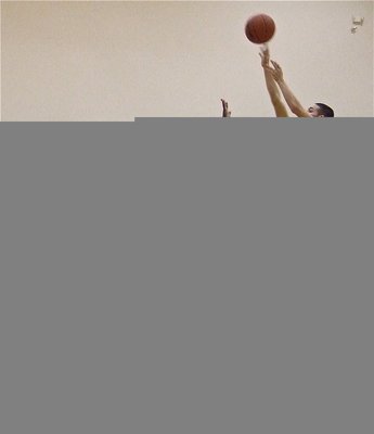 Image: Oscar over the top — Oscar Gonzalez(3) hits a jumper over the Eagles.