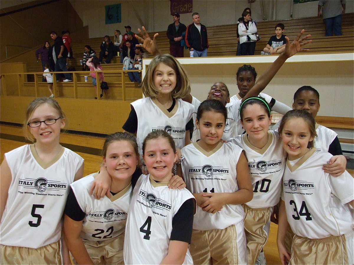 Image: Italy 24 celebrates their 2nd straight win — Italy 24 (5th &amp; 6th Girls), coached by Barry Byers, celebrate their 2nd win of the season after out-pointing Hillsboro Royal Blue 32-10. The win moves Italy 24 into 1st place with a 2-0 record. Not pictured is Hannah Washington who is hiding behind the team.