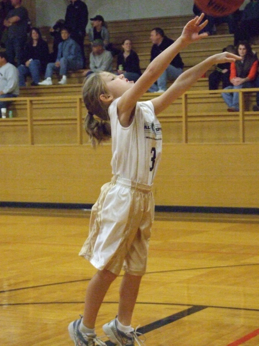 Image: How we do it — Abigail Evans(3) launches a free throw for the Italy 10 team.