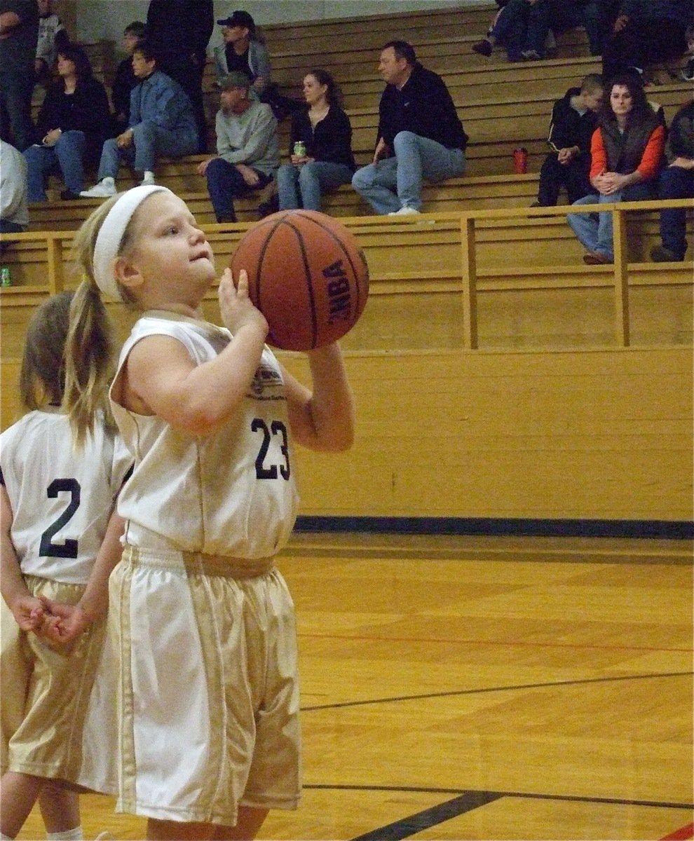 Image: Sydney shoots — Sydney Lowenthal(23) takes a free shot before the 2nd half against Hillsboro Purple.