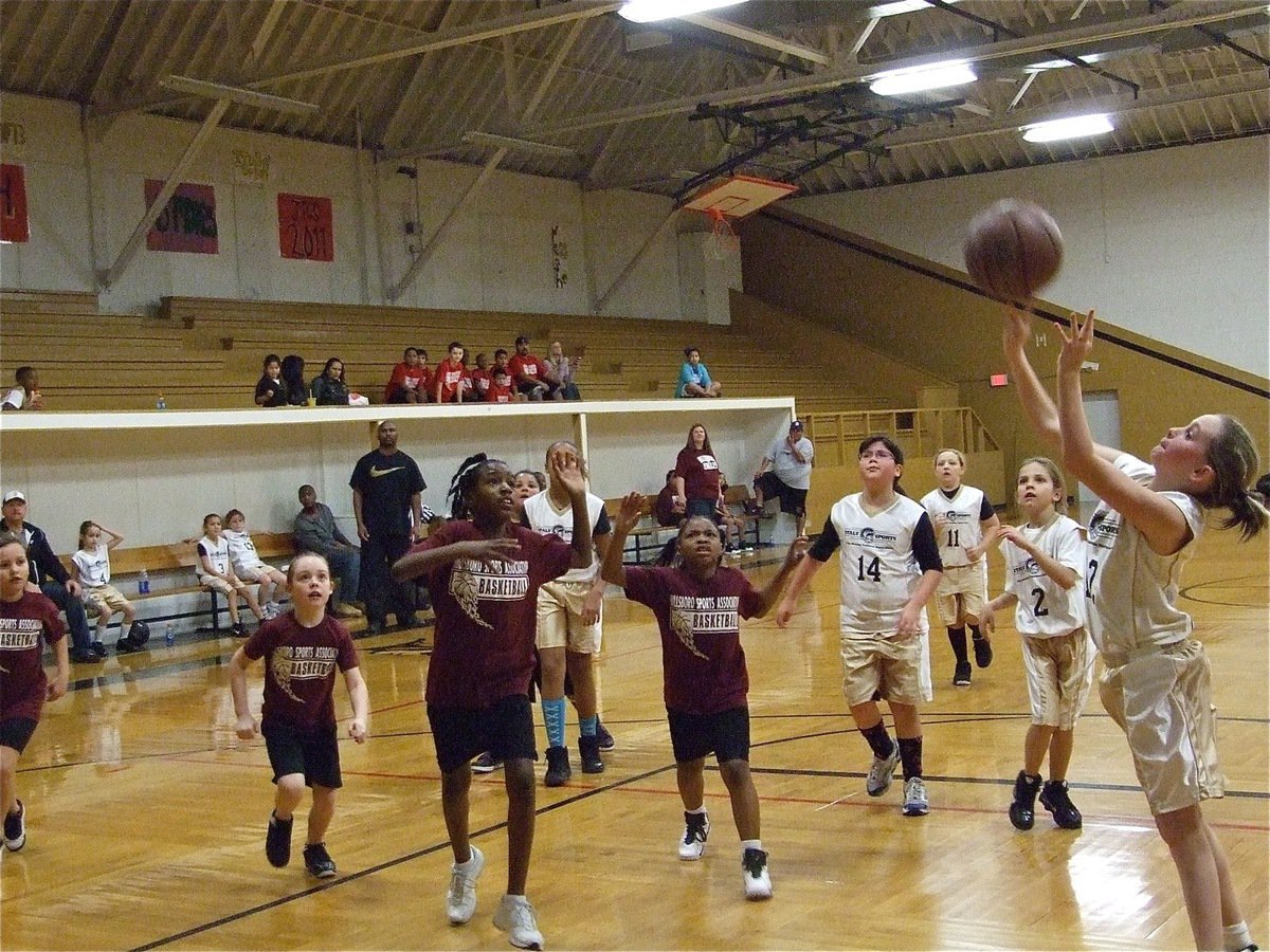 Image: Nelson scores — Kirby Nelson(12) scored 4, 4th quarter points against Hillsboro Maroon.