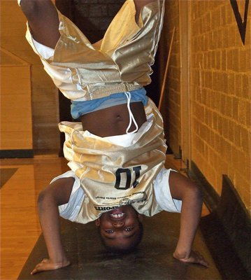 Image: Balance is key — Kendrick Norwood(10) is learning how to find a winning balance between school and sports.