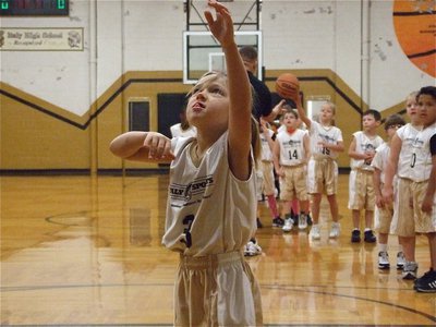 Image: Abby goes for it! — Abigail Evans(3) does her best Michael Jordan impersonation.