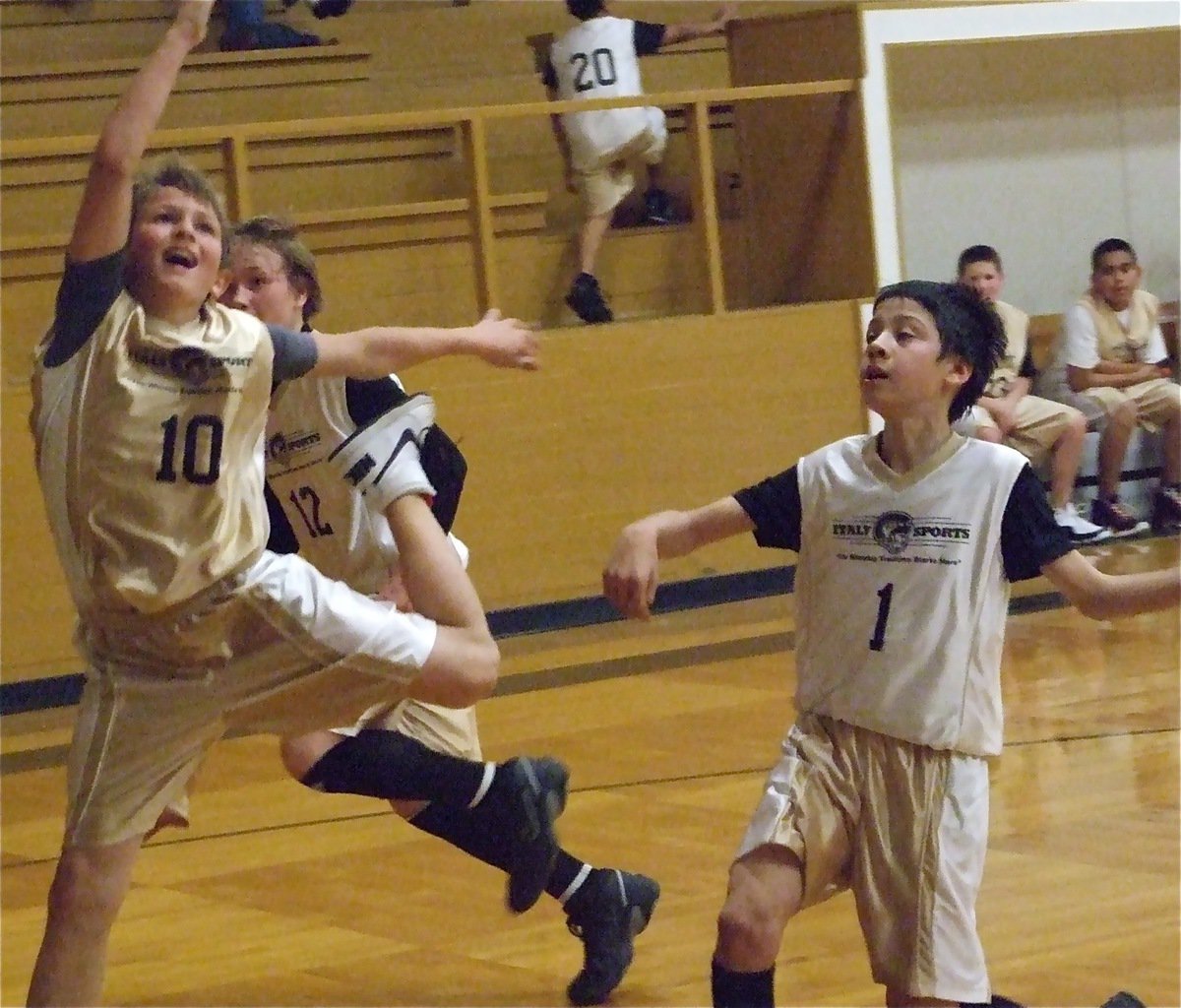 Image: Foul! — Caden Petrey(10) takes a hard foul from Daren Cisneros(1) in an exciting match between Italy 30 and Italy 31.