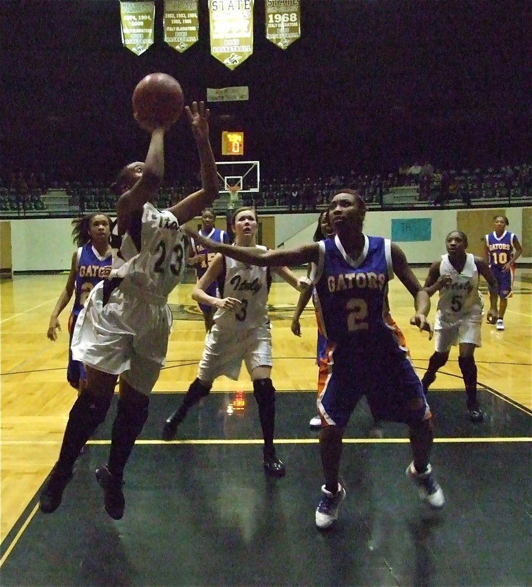 Image: Brianna banks one — Brianna Burkhalter(23) is learning on the fly after being recently moved up to the varsity squad.