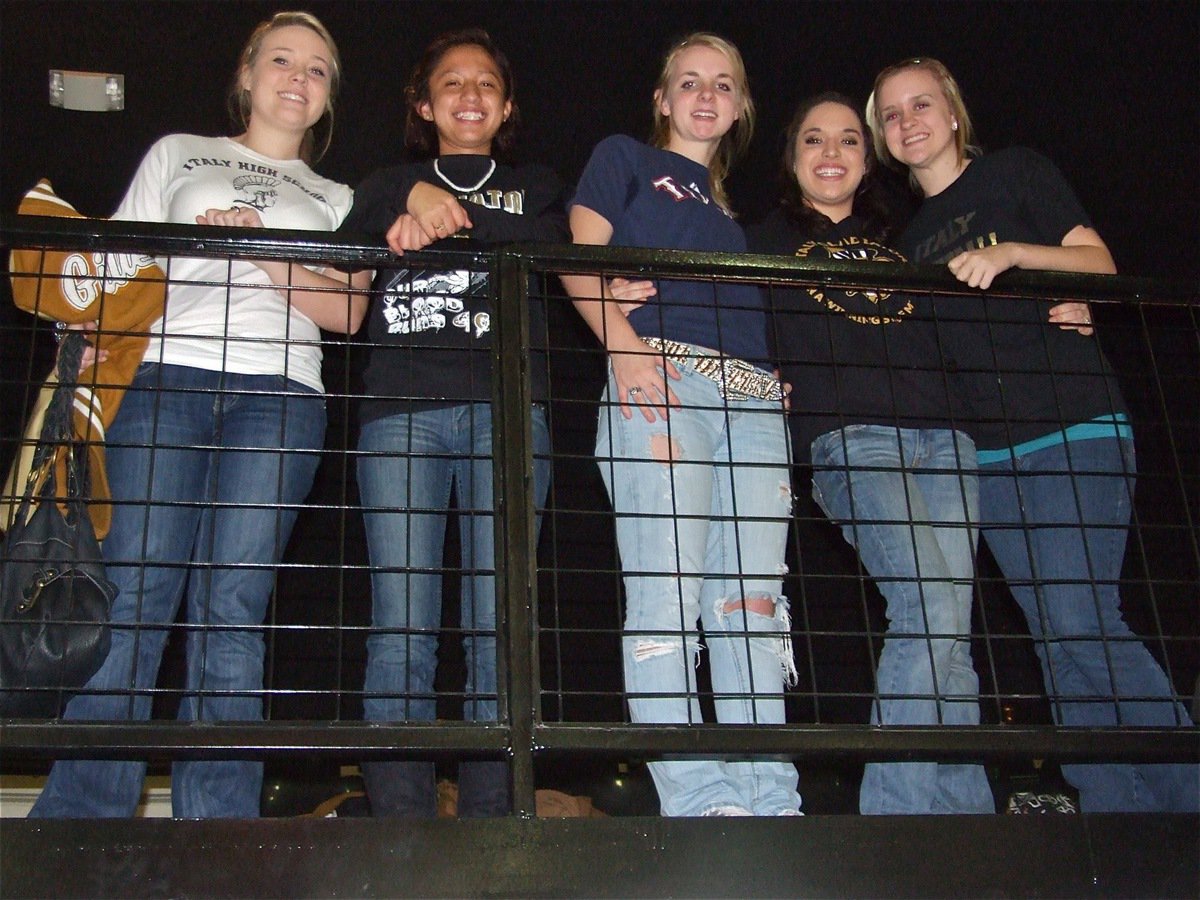 Image: Coliseum Crazies — Shelbi, Maria, Abby, Kelli and Courtney cheer loud inside Italy Coliseum during the games against Gateway.