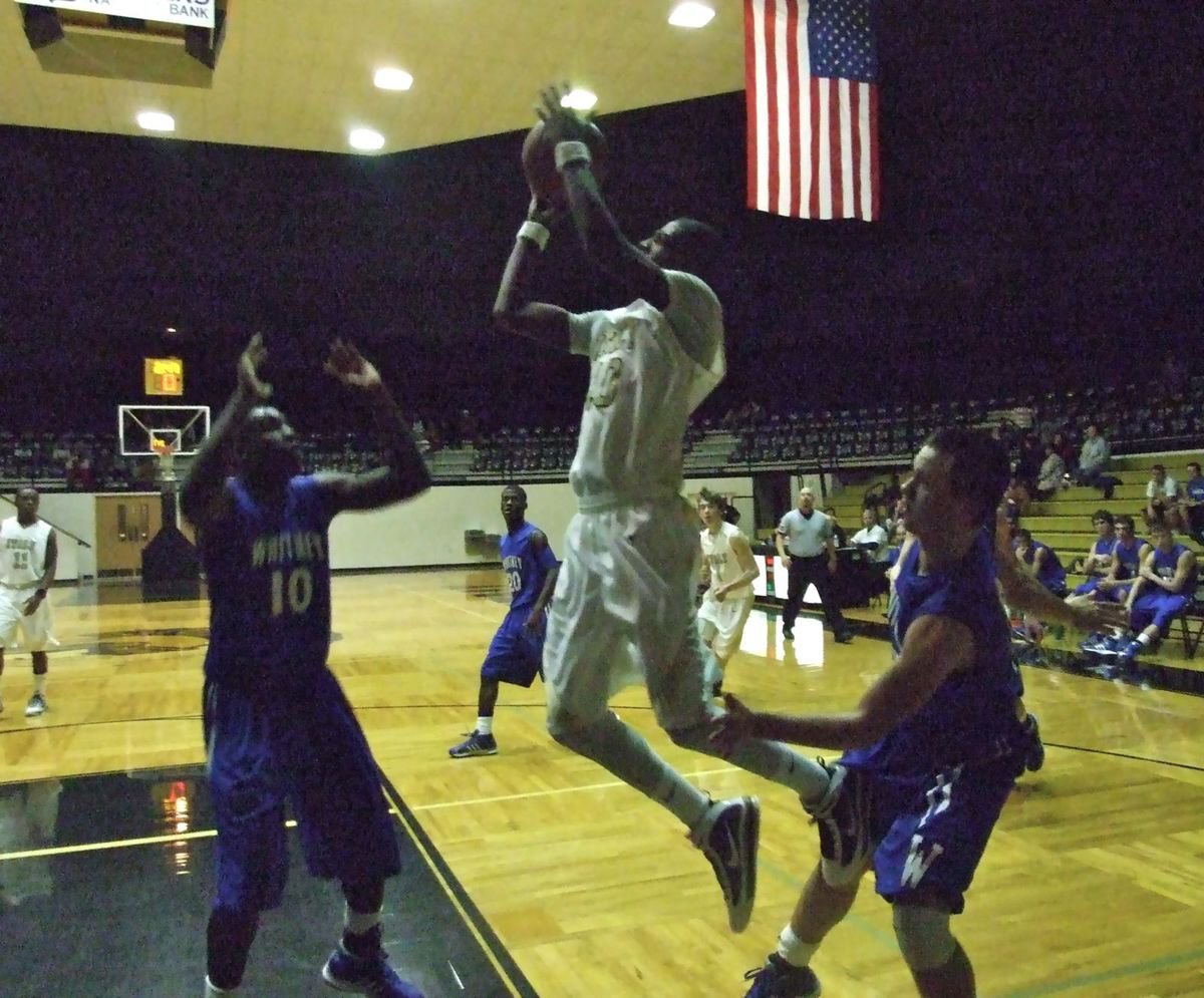 Image: John Isaac — John Isaac(10) goes wild against the Wildcats.