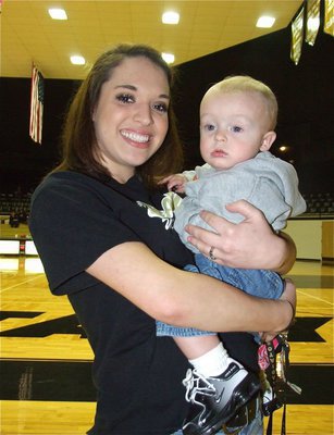 Image: Kelli and Kace — Kelli and Kace pose for a picture during the game.