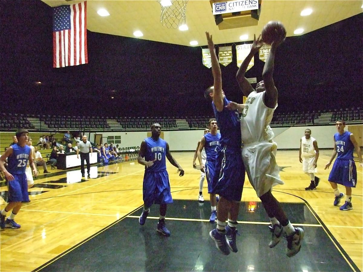 Image: Mayberry attacks — Larry Mayberry(13) attacks the Wildcat defense for a score.