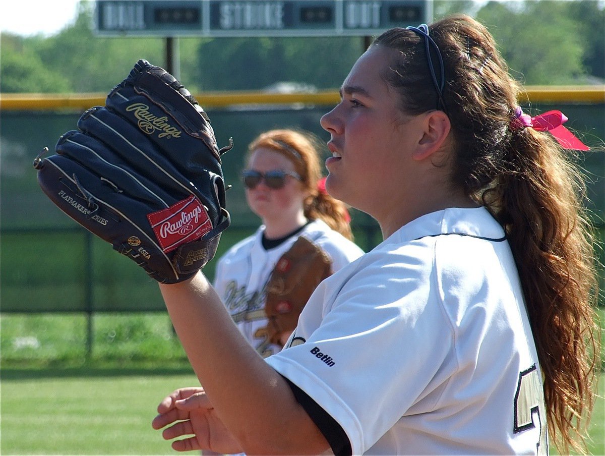 Image: Brashear on first — Nikki Brashear gets loose on first base before the game.