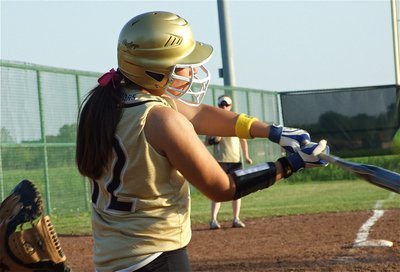 Image: Alyssa smacks a double — Alyssa Richards(12) hits a double over the Lady Cougar infielders.